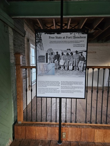 exhibit panel with photographs of maps and United States Colored Infantry plus text