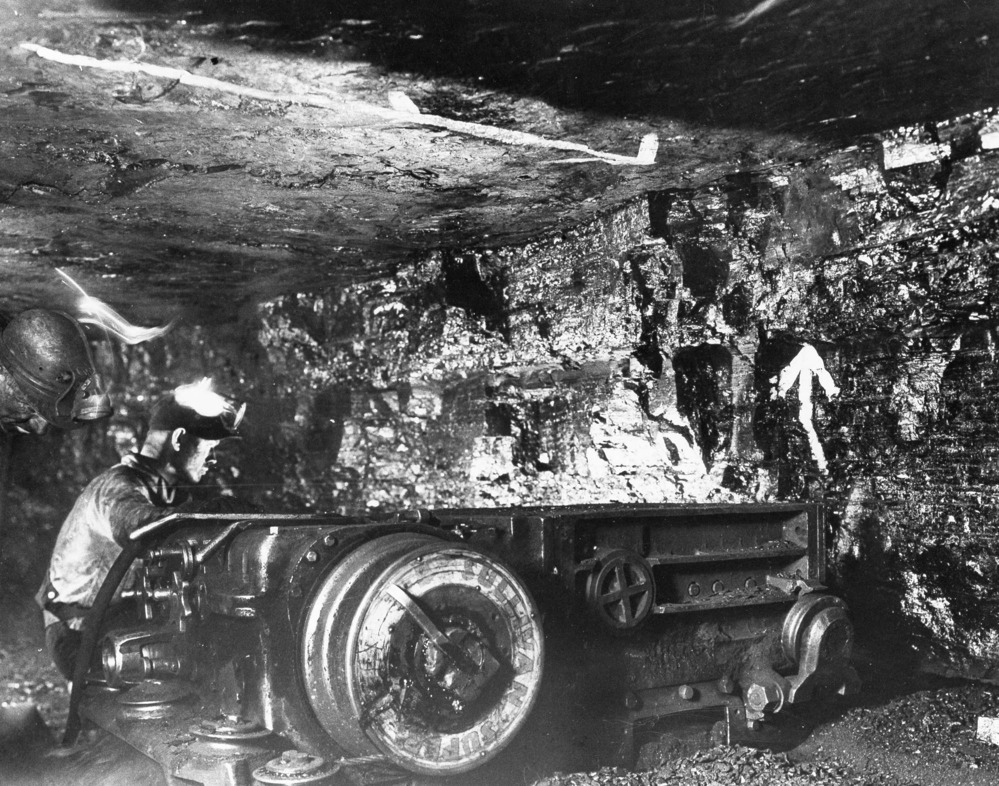 The cutting machine was used to cut along the bottom of a coal seam so that when the coal was blasted loose it would drop down and not shoot out.