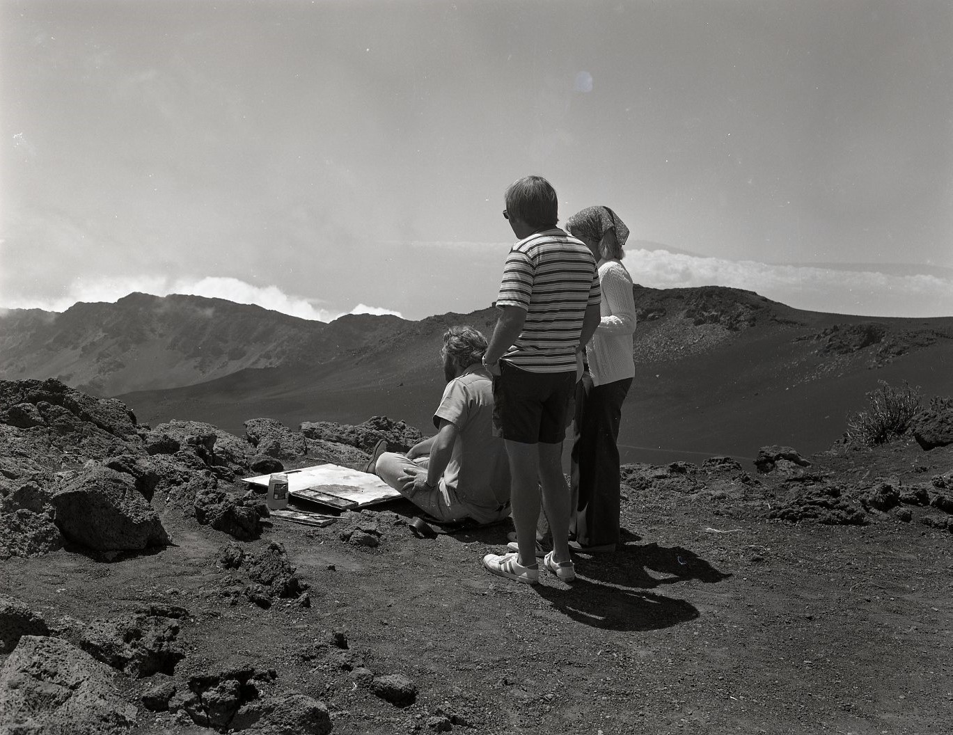 Bruce McGrew with visitors at the summit. 