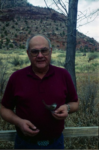Color Photo of wooden Canyon Wren added to museum in January 1995, and the carver, Charles Foote.
