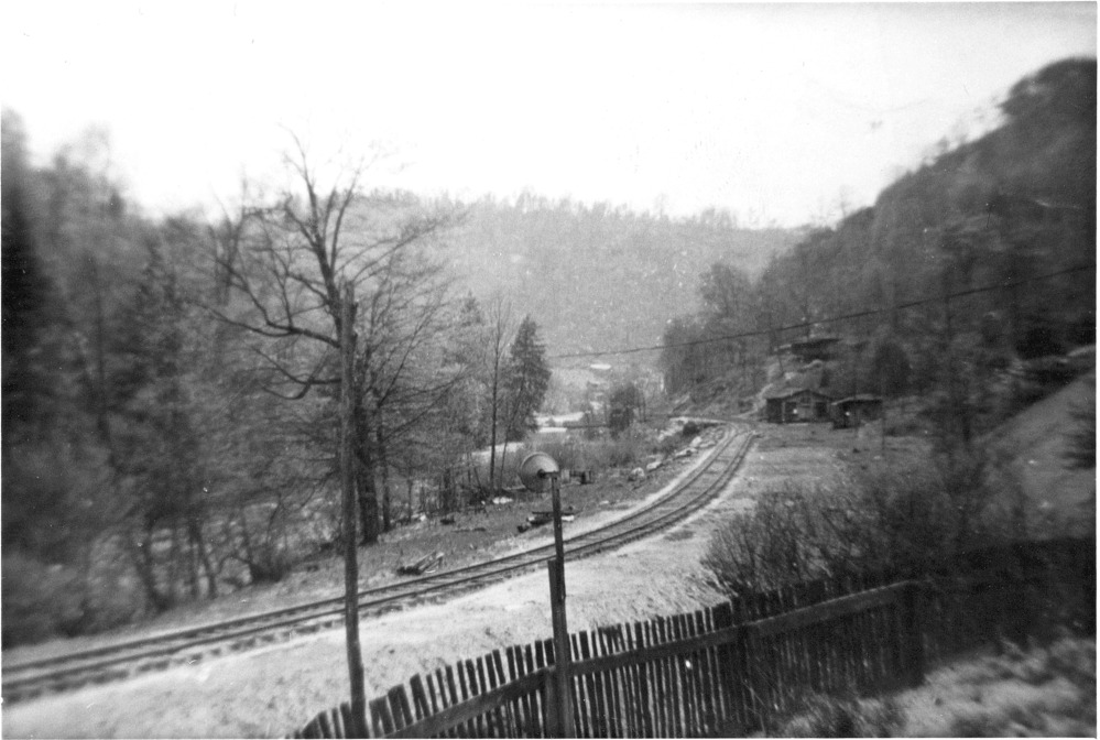 The rail tracks of the Oneida and Western O&W Railroad wind through the mining town of Zenith.