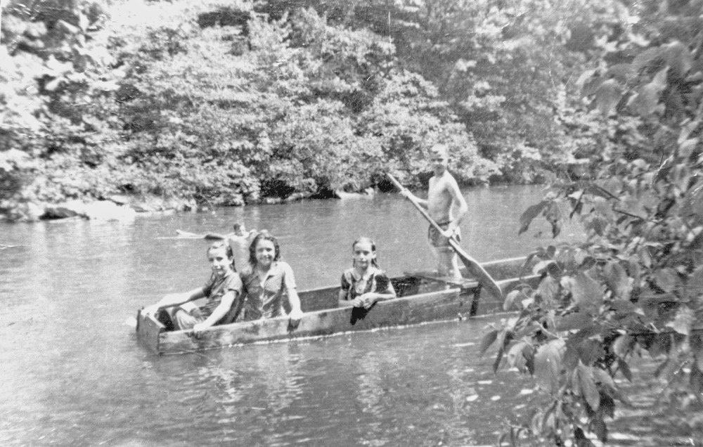 Children at Zenith in the 1930's enjoying a john boat excursion on North White Oak Creek.