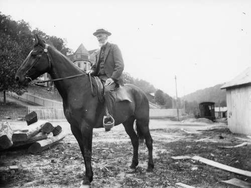 historic photo of man on a horse