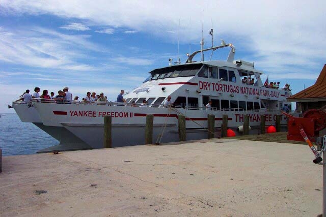 Visitors from Key West arrive at Garden Key Dry Tortugas National Park for a day after a boat trip on the Yankee Freedom from Key West