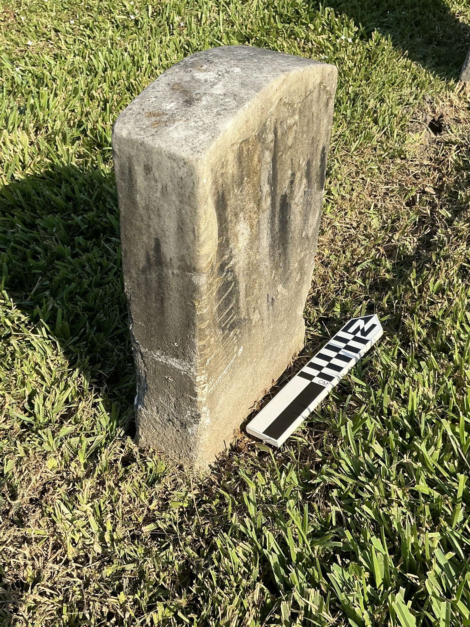 Extra image of historic upright marble headstone with recessed shield face.