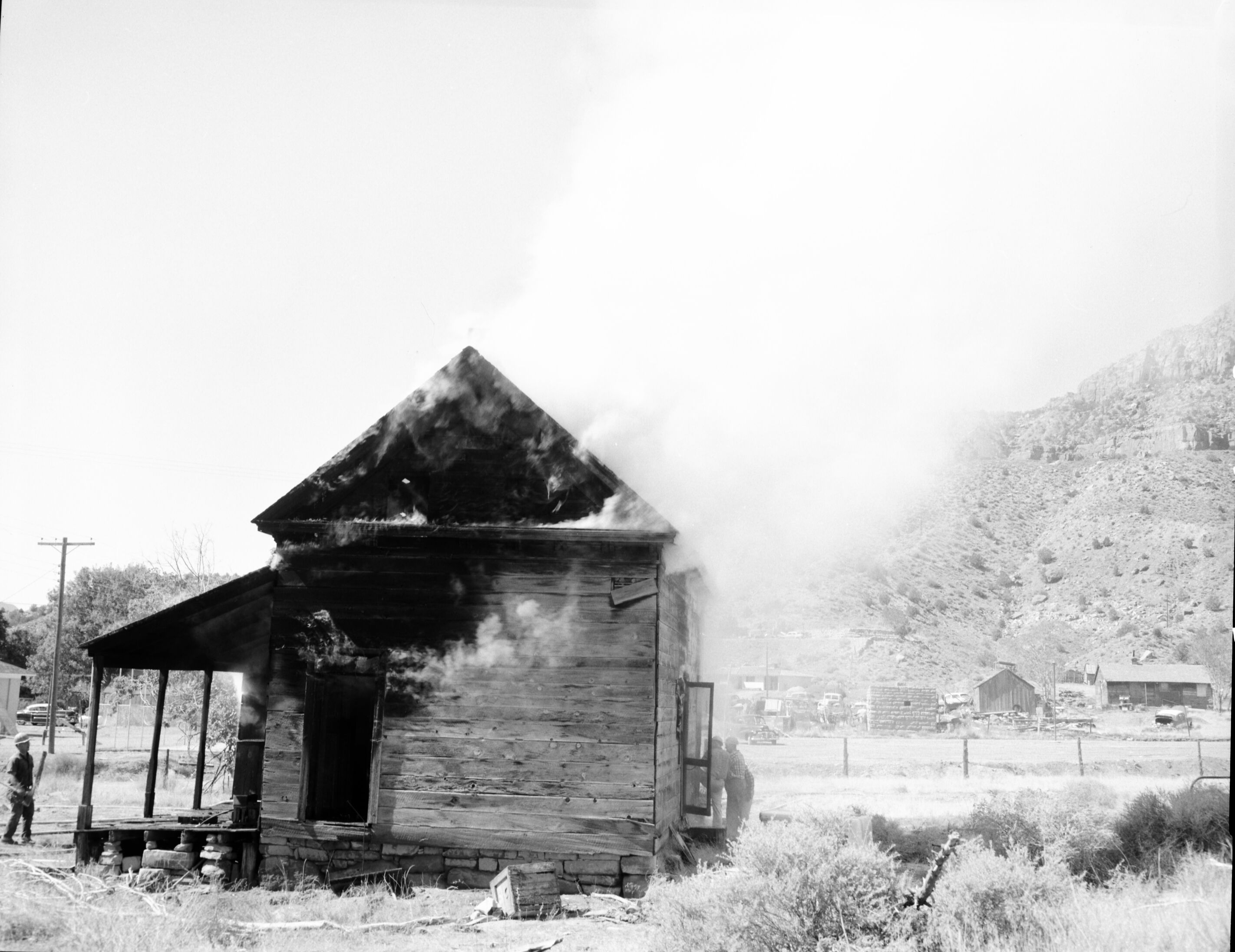 Fire prevention training; demonstration for students of Springdale school. Burning of old Justet home adjacent to Springdale school.