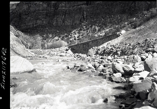 Virgin River and the rock retaining wall alongside the road at the slide area in Zion Canyon.