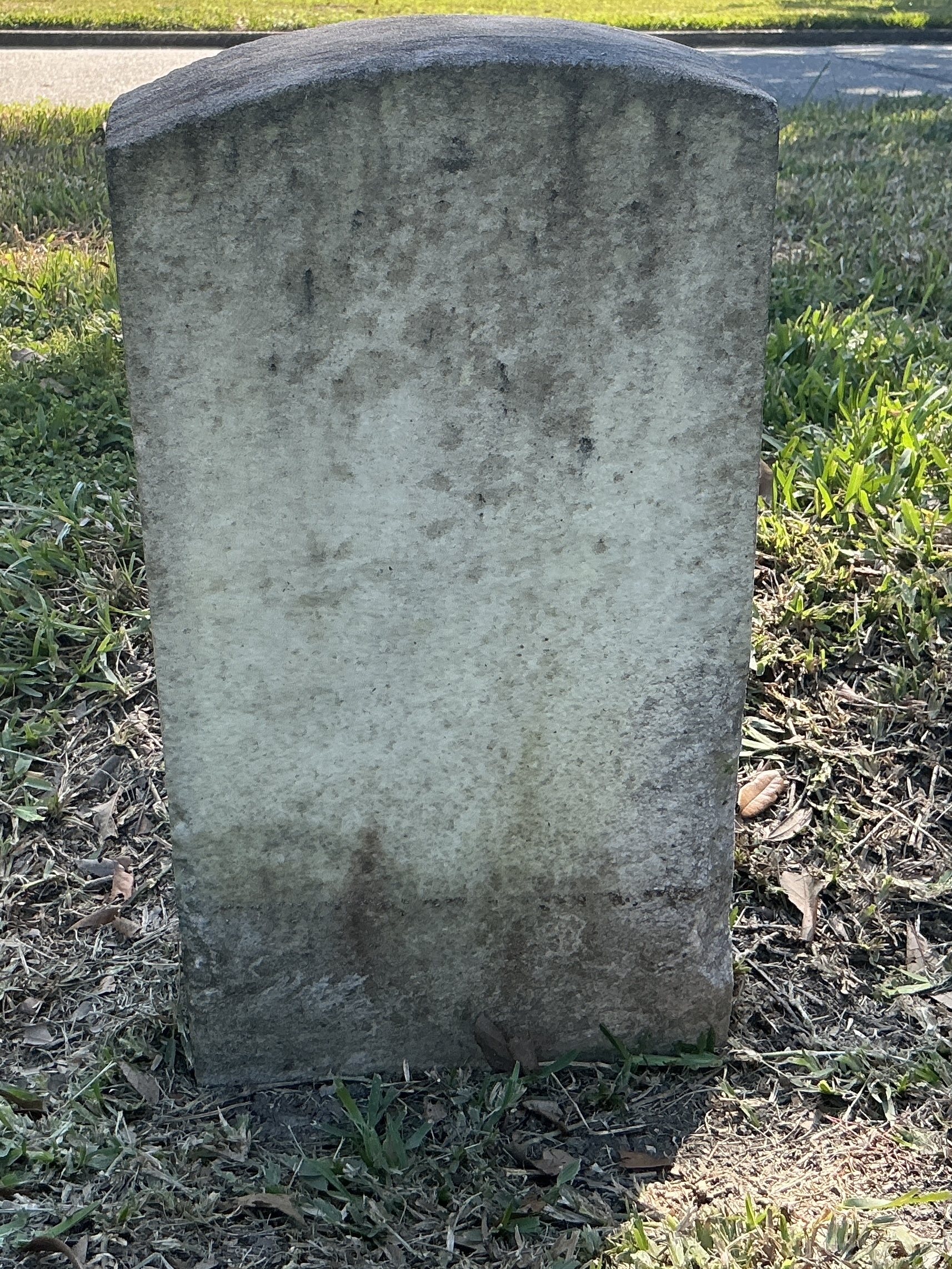 Additional photo of  historic upright marble headstone with recessed shield face.