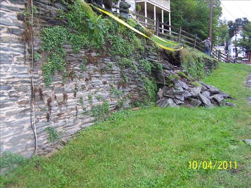 The stone masonry fallout on Saturday, October 1, 2011, at the upper terrace of the historic High Street Retaining Wall (HAFE LCS 03887) in Lower Town, Harpers Ferry, located just above High Street and just below Public Way Street.