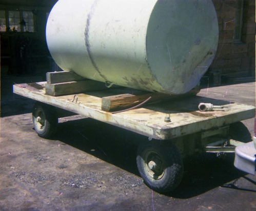 Color Photos of park trailers. Tank loaded onto trailer.