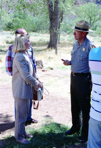 Color Photos of the parks 72nd anniversary celebrations- cake cutting, barbecue, speakers.