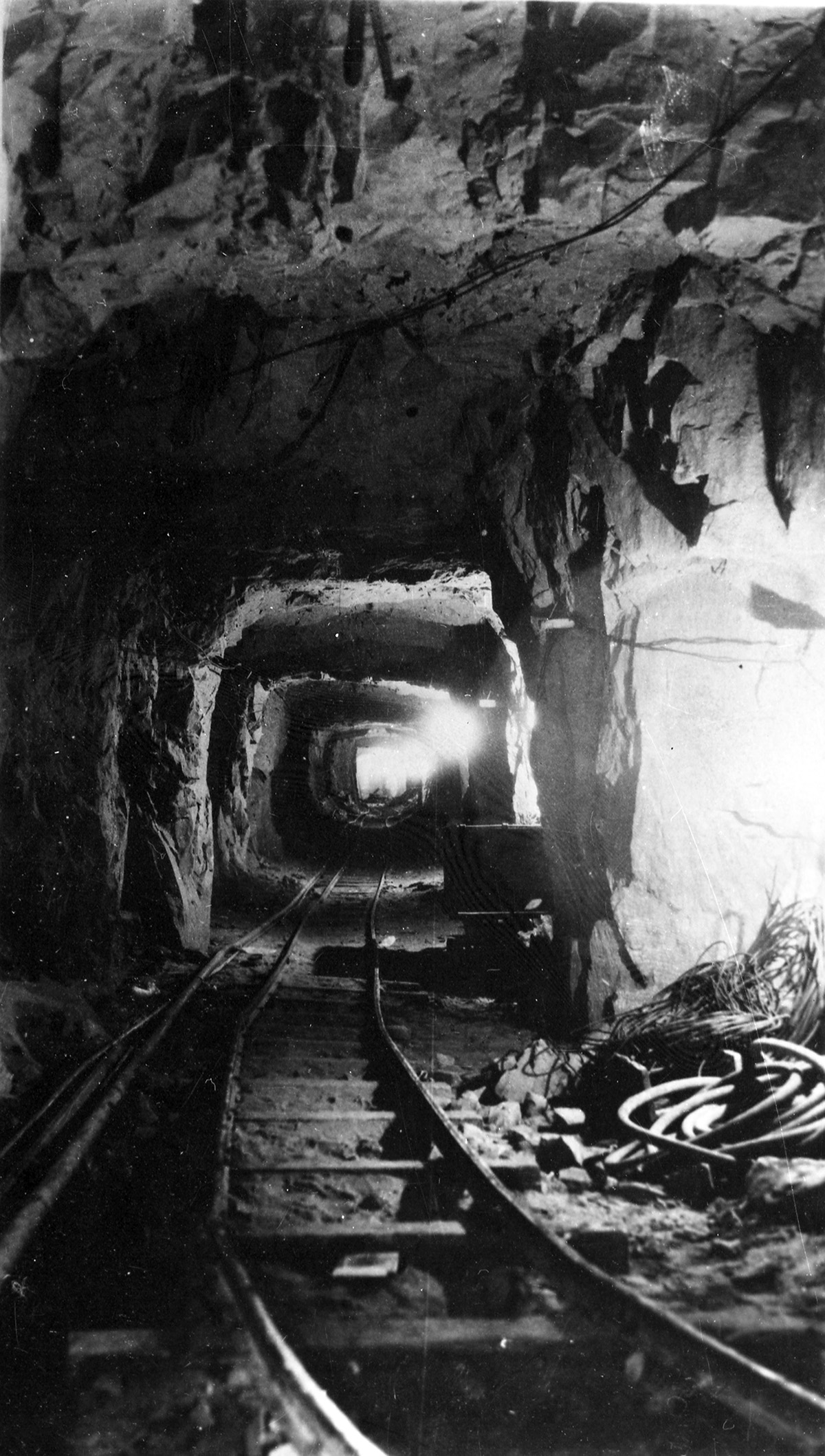 Long tunnel, supplemental construction rough cuts and tracks for tram- looking west.