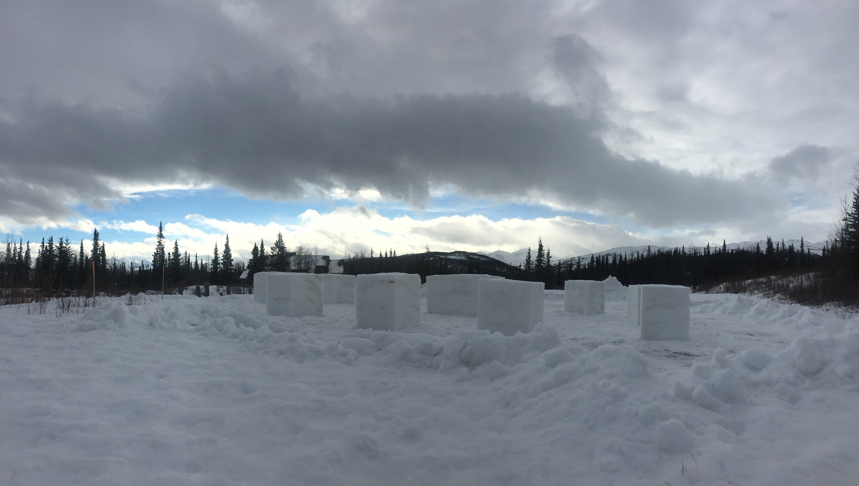 Snowblocks sitting in a parking lot