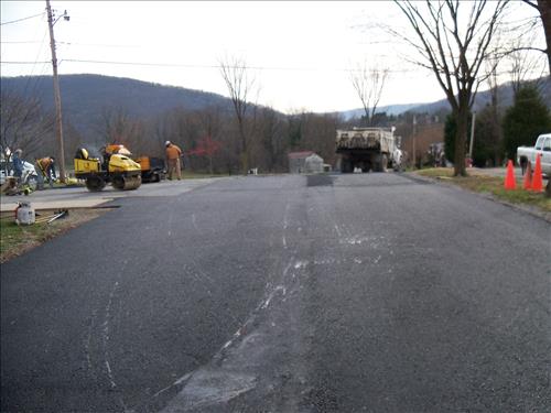 Views of the gravel roads and parking areas relaid by the project in 2011 at the HAFE Park Grandview School and Lancaster Street.