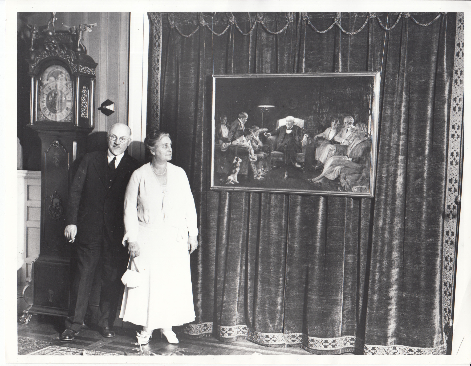 Hulbert Hitchcock, the artist, and Mina Edison looking at Hitchcock's painting of Thomas Edison at Glenmont.