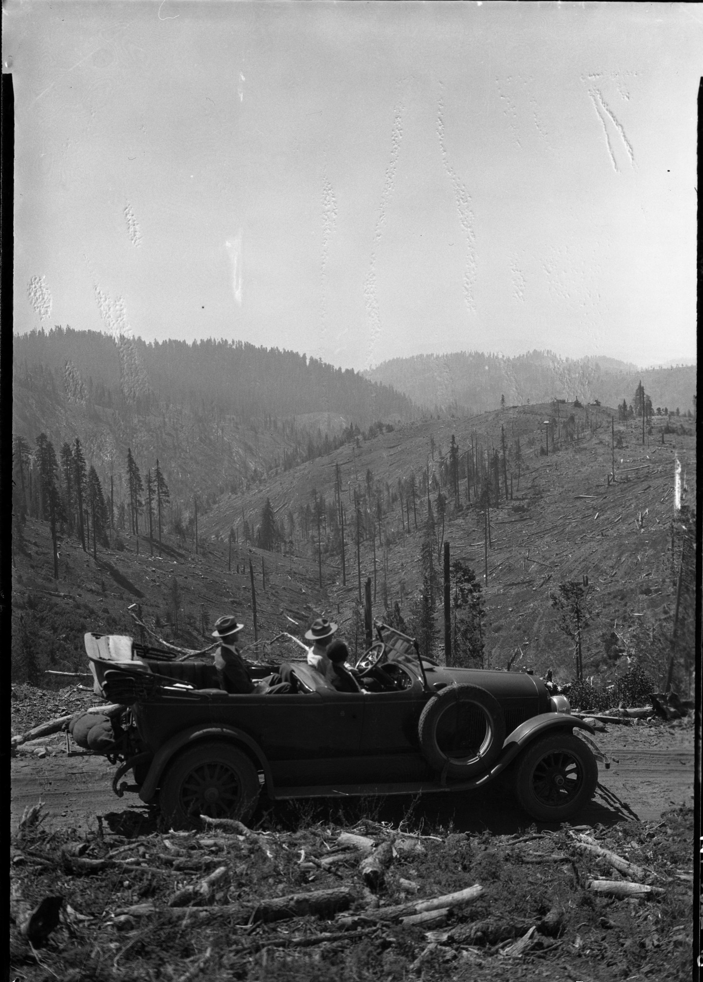 Copy Neg: Mike Floyd, 1993. Mr. & Mrs. C.C. Marshall of N.Y. City at cutover area.