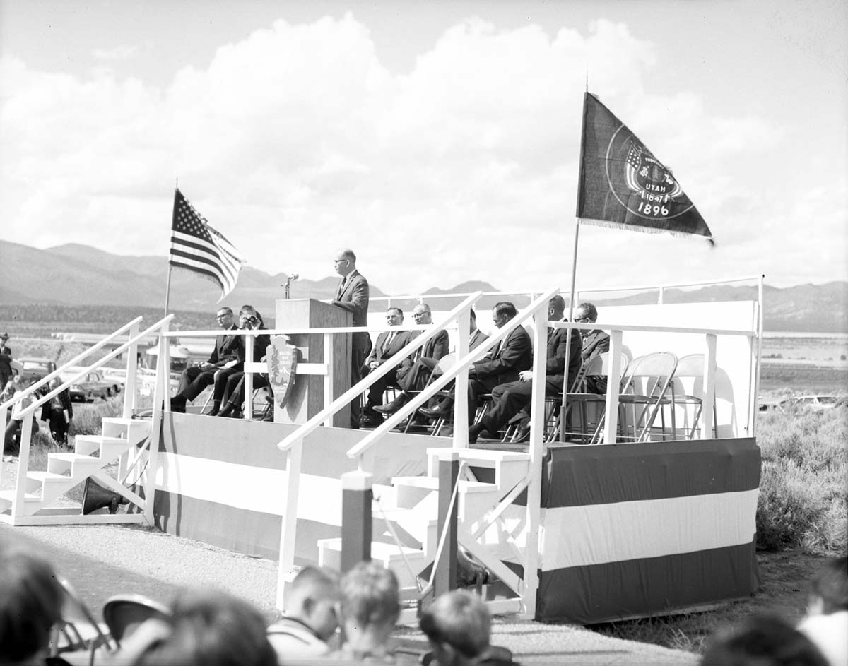 A. Karl Larsen, Dixie College historian [Dixie State University], addressing visitors from podium at dedication of Taylor Creek road (Kolob Canyons).