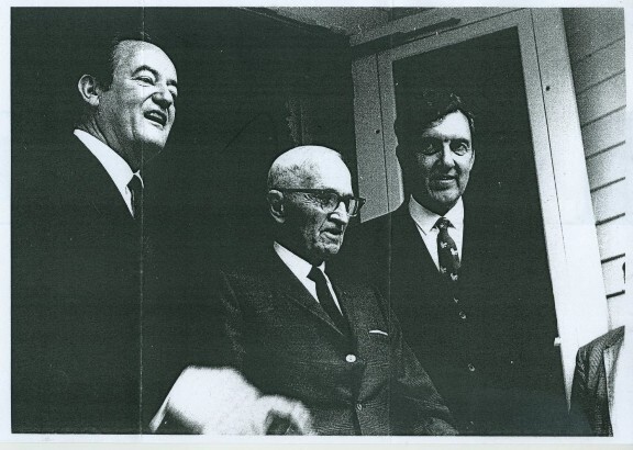 Photograph of Hubert H. Humphrey, Harry S Truman, and Edmund S. Muskie on the front porch of the Truman home, September 22, 1968. (Unidentified photographer, Edmund S. Muskie Papers, Series XI, Album 19, Edmund S. Muskie Archives and Special Collections Library, Bates College)
