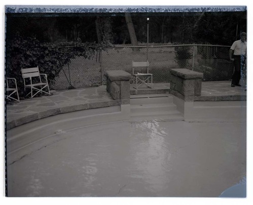 Lounge chairs alongside the pool at Zion Lodge.