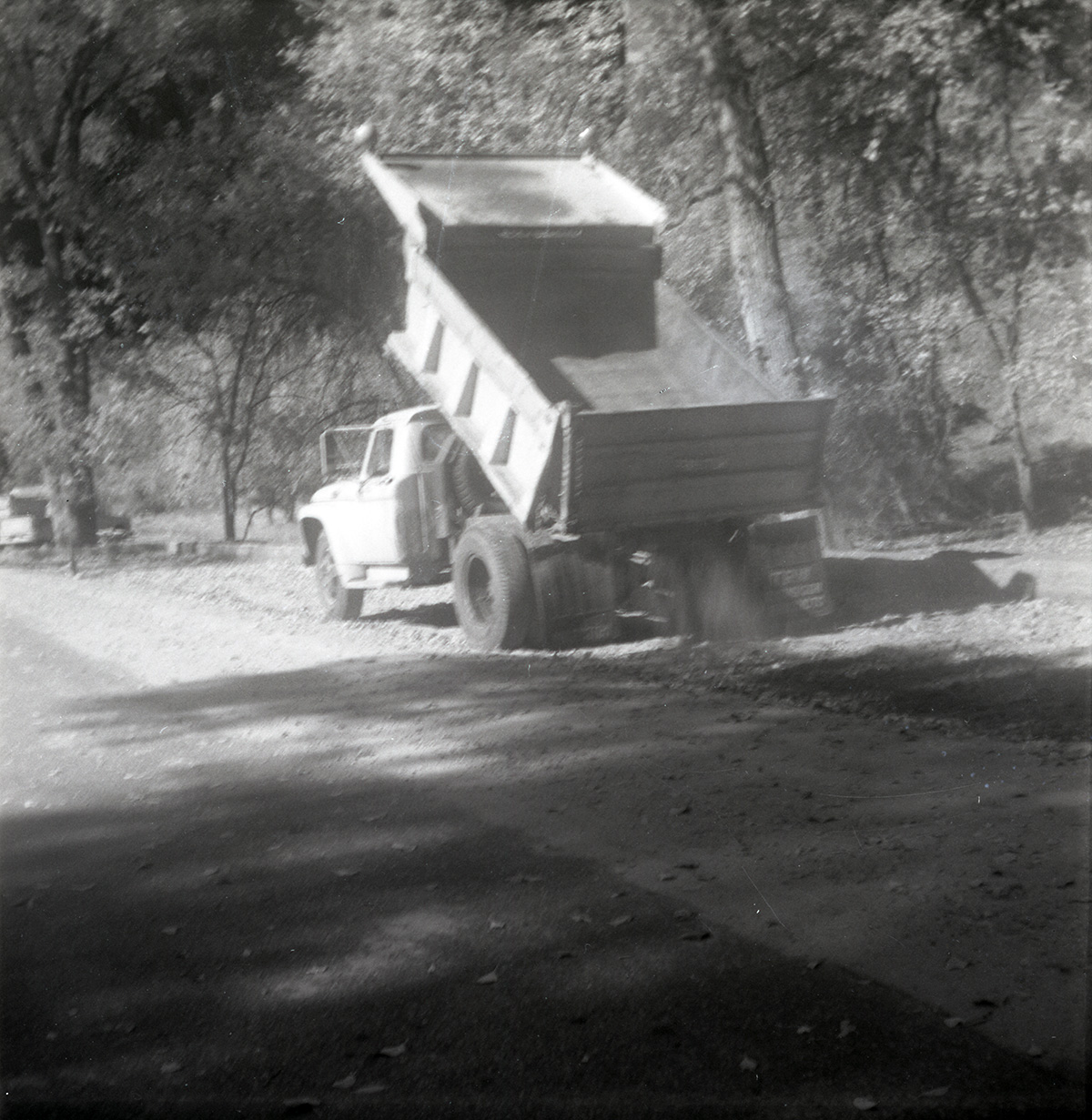 Dump truck dumping gravel for road construction near the Temple of Sinawava.