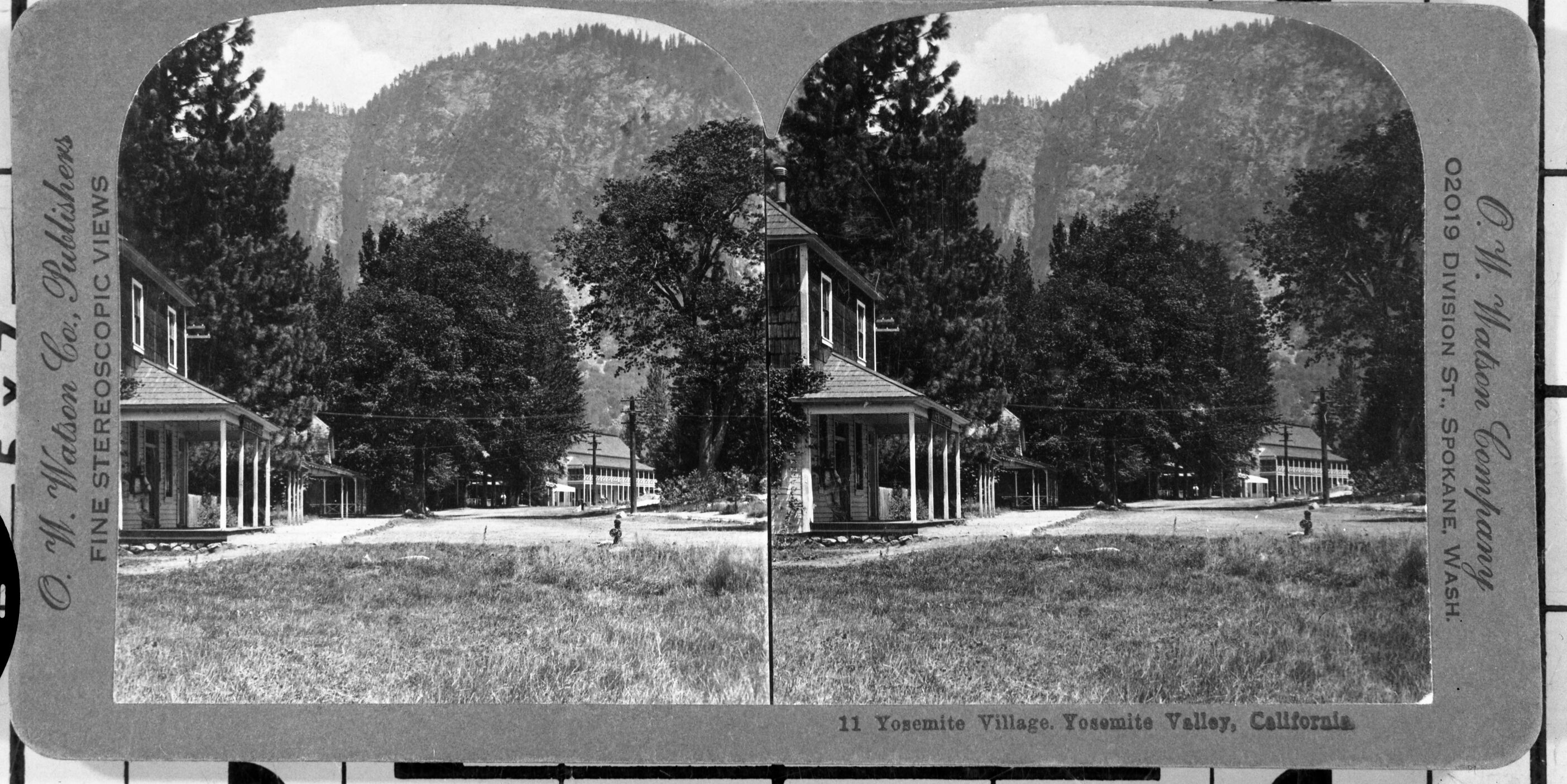 Copy Neg: July 1985 by Michael Dixon. Stereo card from L. Smaus Collection. Original card dark grey with dark sepia toned prints. Captioned: "11. Yosemite Village. Yosemite Valley, California." Sentinel Hotel at right; old Yosemite Store at left. For detail, see RL-16,519.