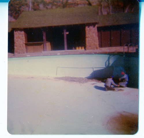 Workers preparing for the destruction of the lodge pool and bathhouse.