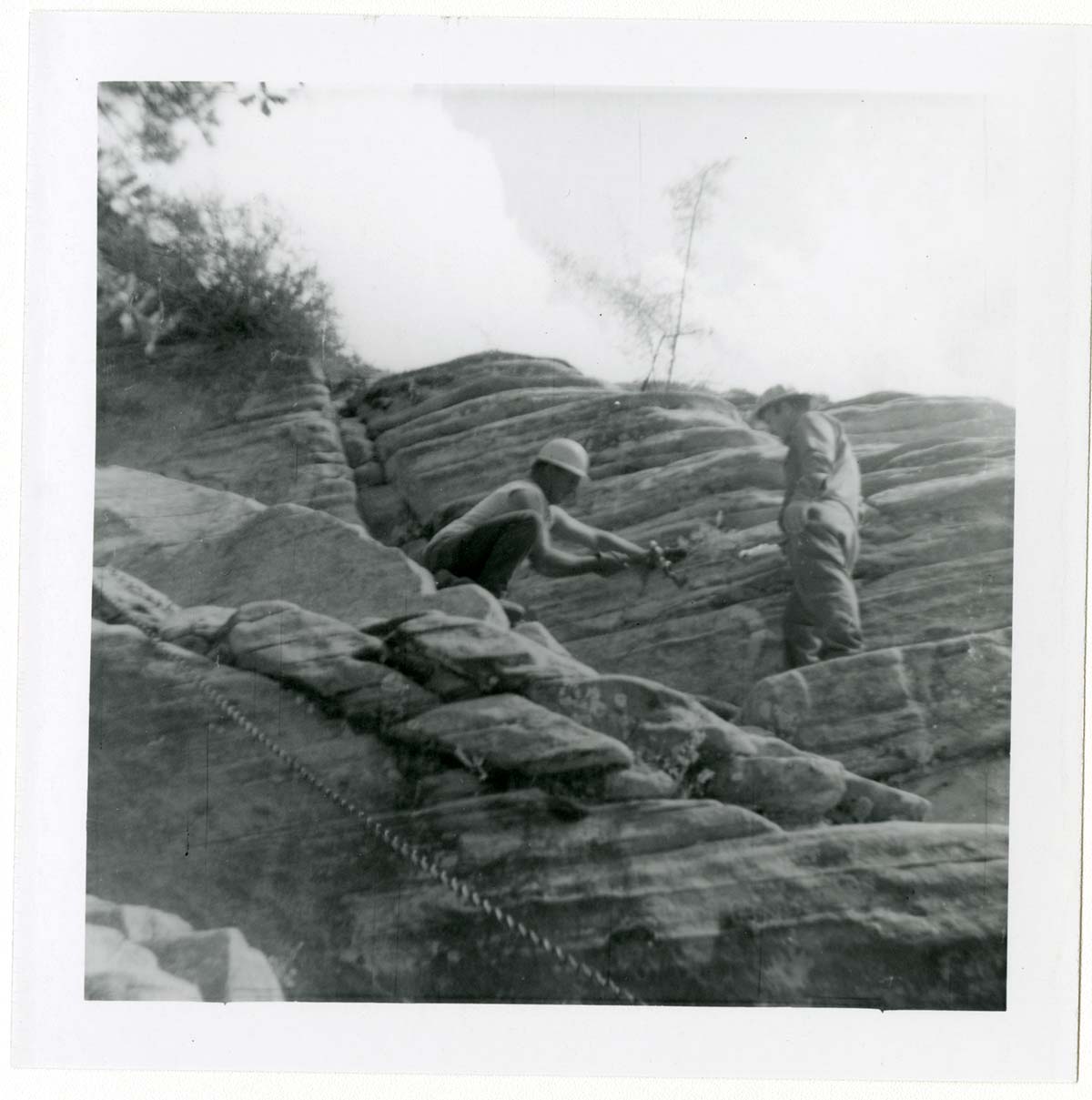 Workers during the Lady Mountain sign emplacement.