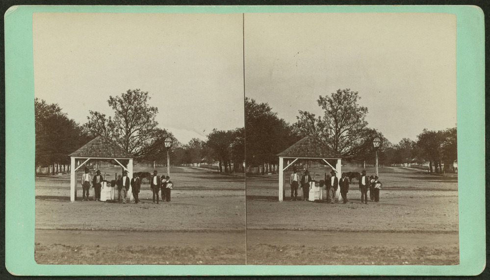Group of African Americans standing by Richland Avenue in Aiken, South Carolina