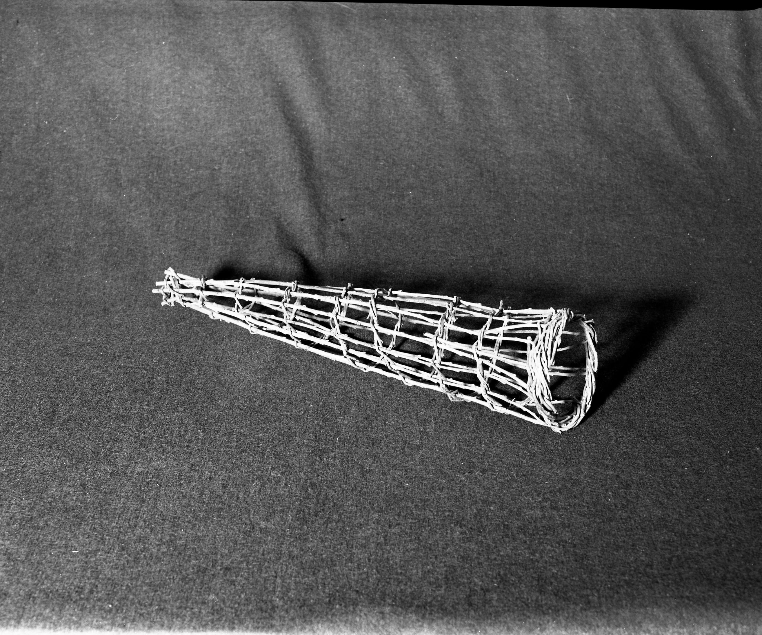 Marie Rozier Collection, Catalog No. --. Object: Pomo-style, woodpecker trap. Dimensions: 19". Materials: unpeeled willow. Technology: ---. Collection History: Made by Craig Bates, 1978. Photographed by Michael Dixon, December 1982. Catalogued by Craig Bates and Barbara Beroza. Yosemite Collections, National Park Service.