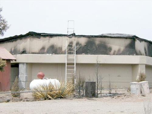 Fire damage to the water tank structure from the Long Mesa Fire, Mesa Verde National Park, July-August 2002