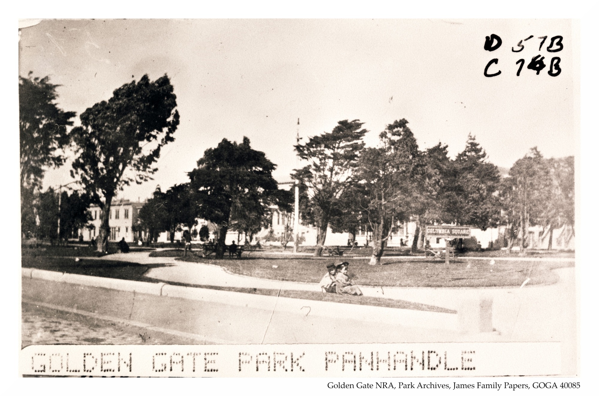 Some people sitting in the Golden Gate Park panhandle. 