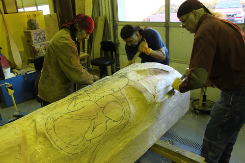 Carvers work on the Chookaneidi Pole