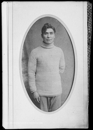 Alaska Native man wearing a sweater.