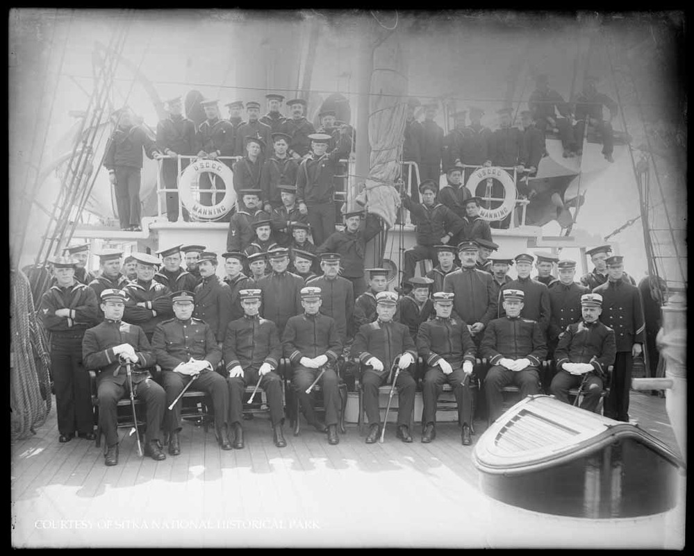 Officers and crew of the U.S.C.G. Manning on deck of the ship.