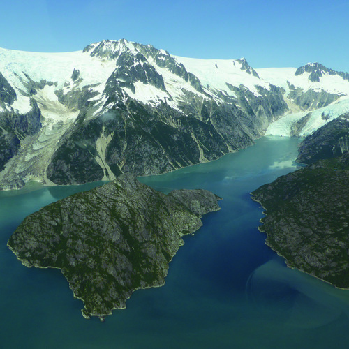Photograph of Harris Bay, with Northwestern Glacier seen in the top right and the Harding Icefield visible along the top of the photograph.