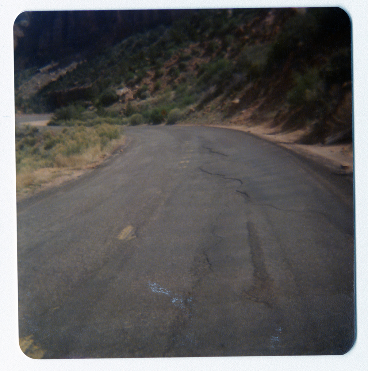 Section of road with crack in need of repair.