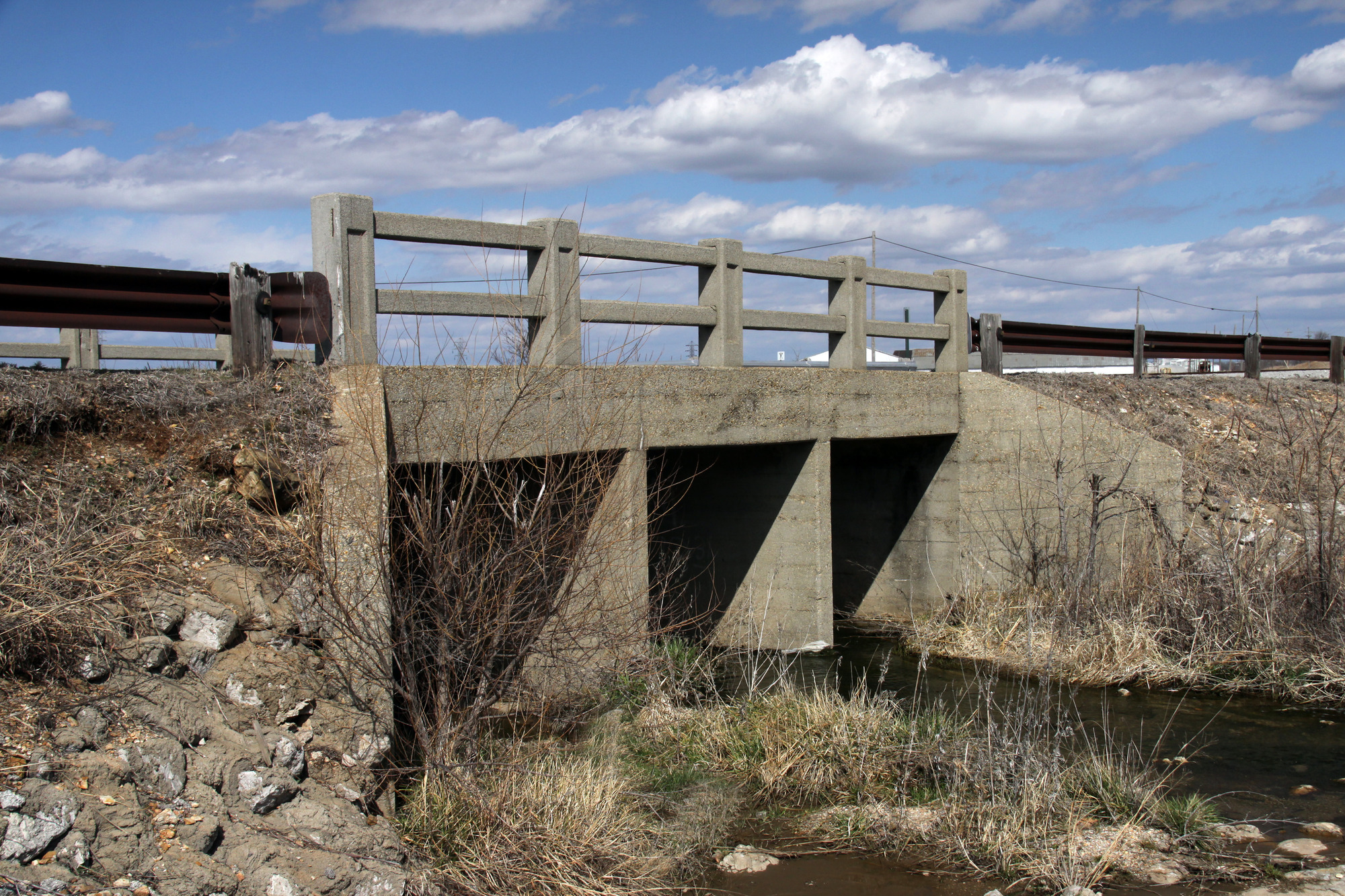 Concrete slab bridge on tributary to Short Creek just E. of RR Viaduct on Front St., Galena
