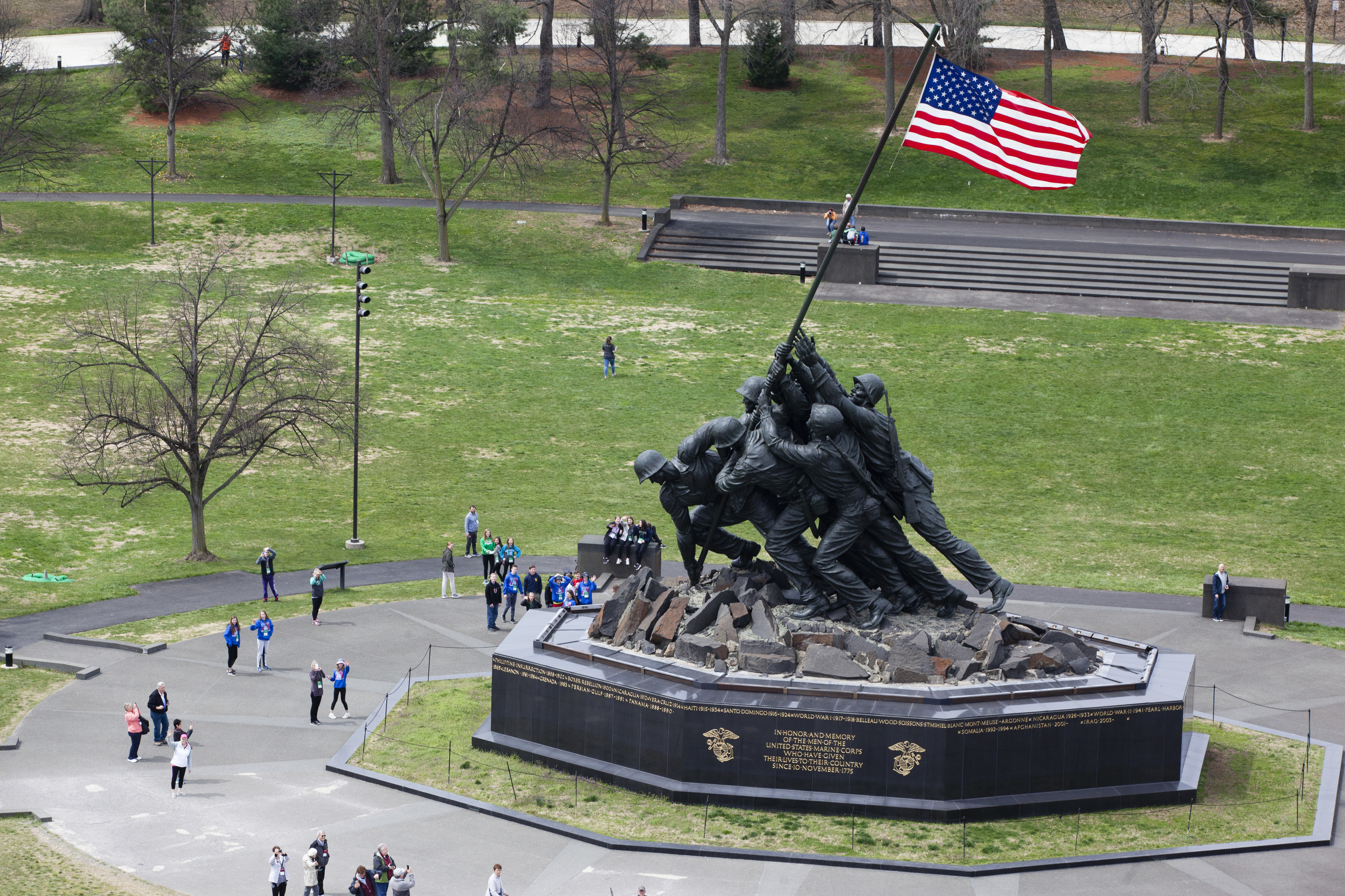 Aerial view U.S. Marine Corps War Memorial, several visitors are standing around it