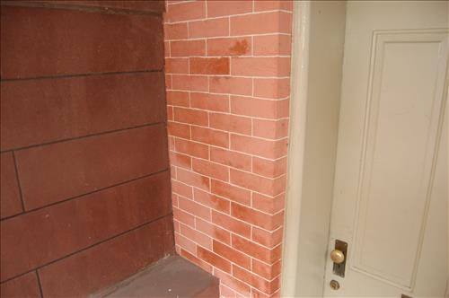 Water infiltration and damage to walls and floor of the Petersen House