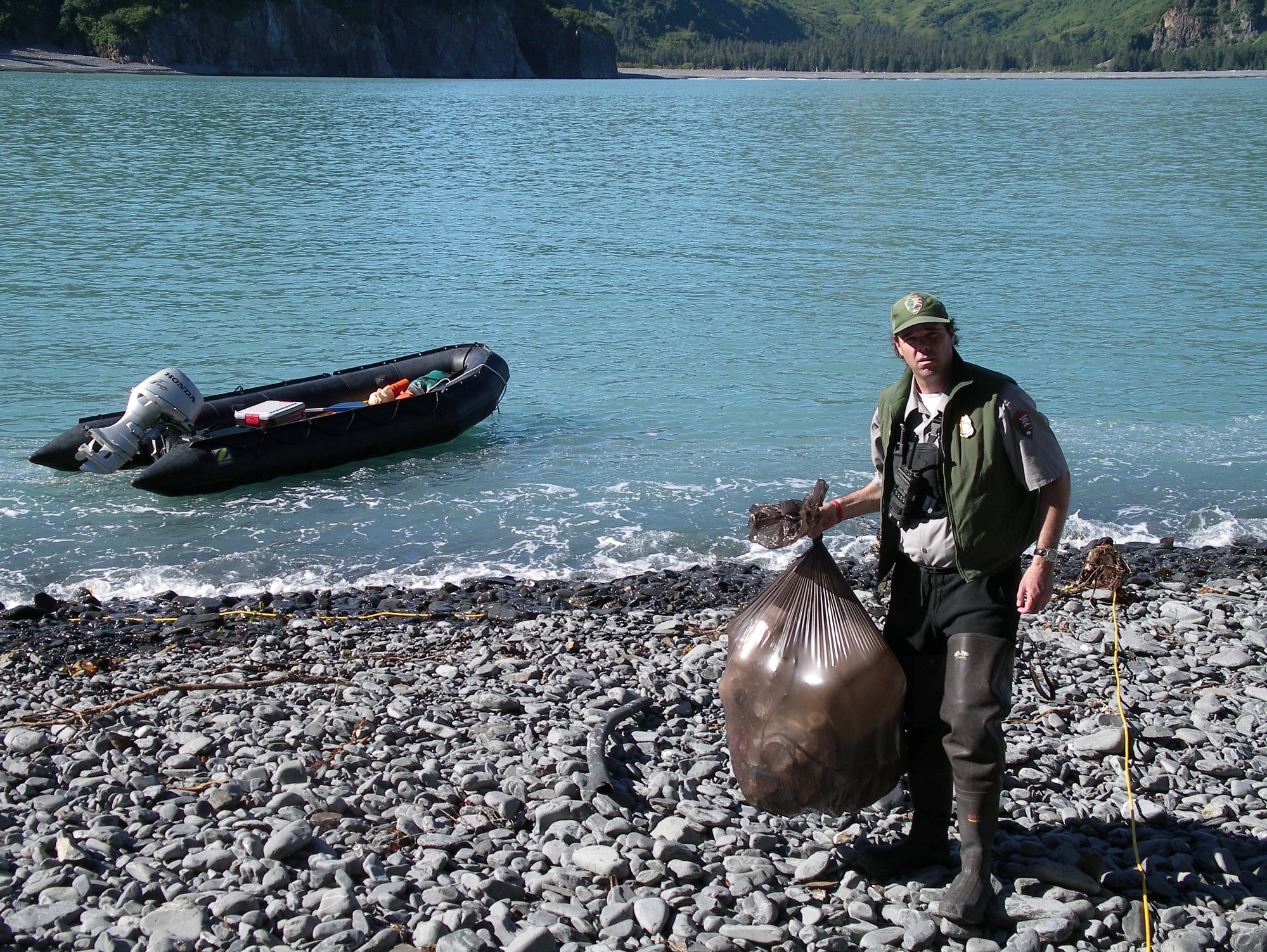 LE Ranger Keith Bunney hauls trash to the boat