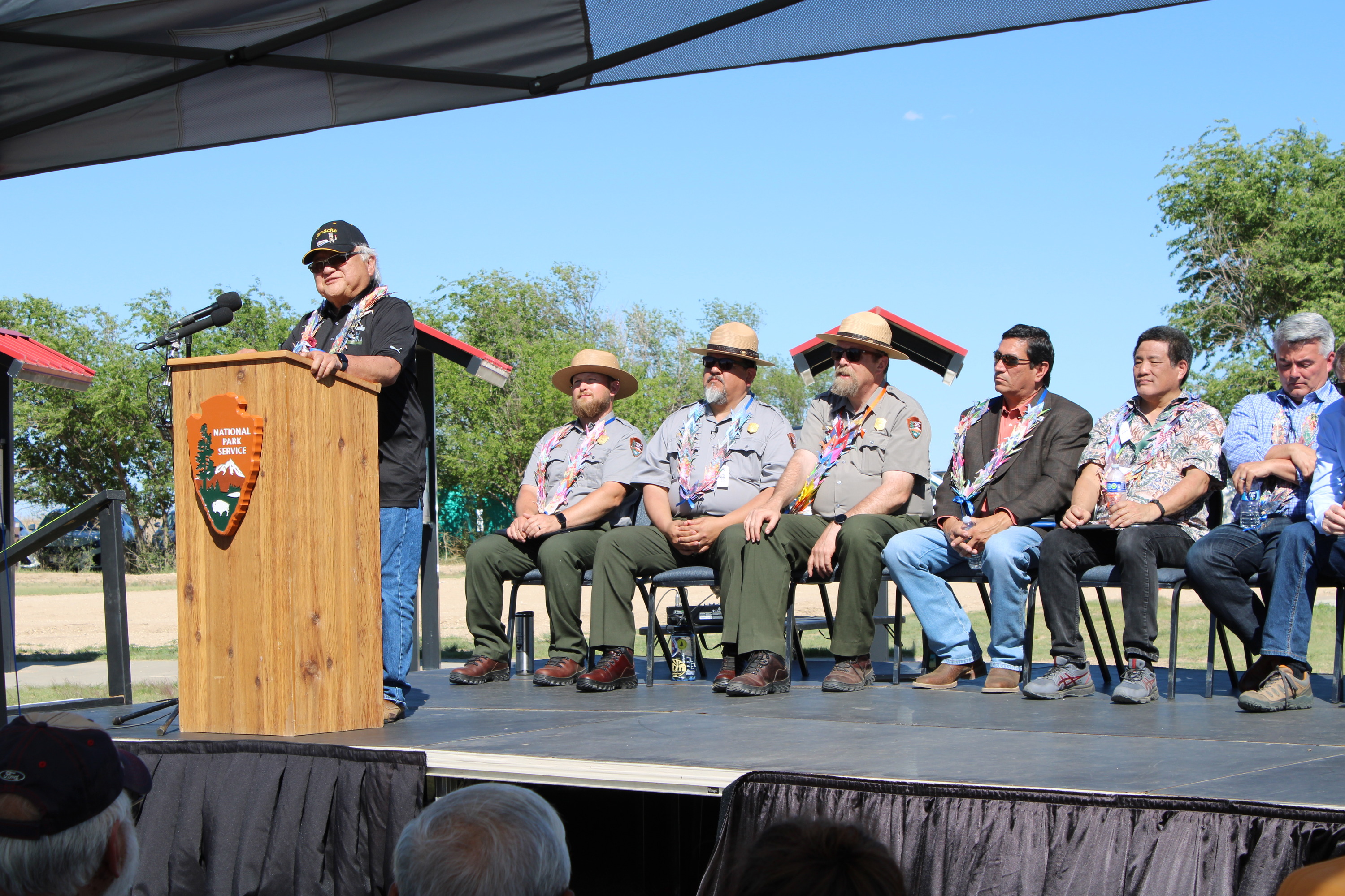A man standing behind a podium on stage