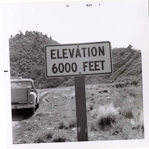 Sign reading 'Elevation 6000 Feet' in Kolob Canyon.