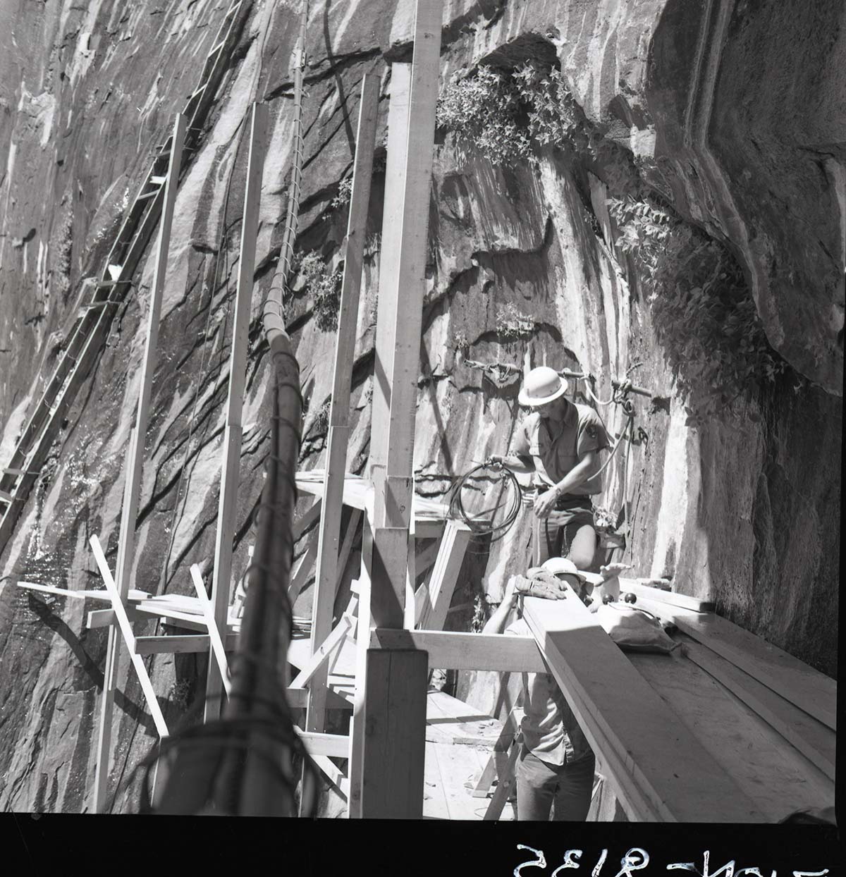 Scaffolding and crew member used for upgrade of water system at Temple of Sinawava.