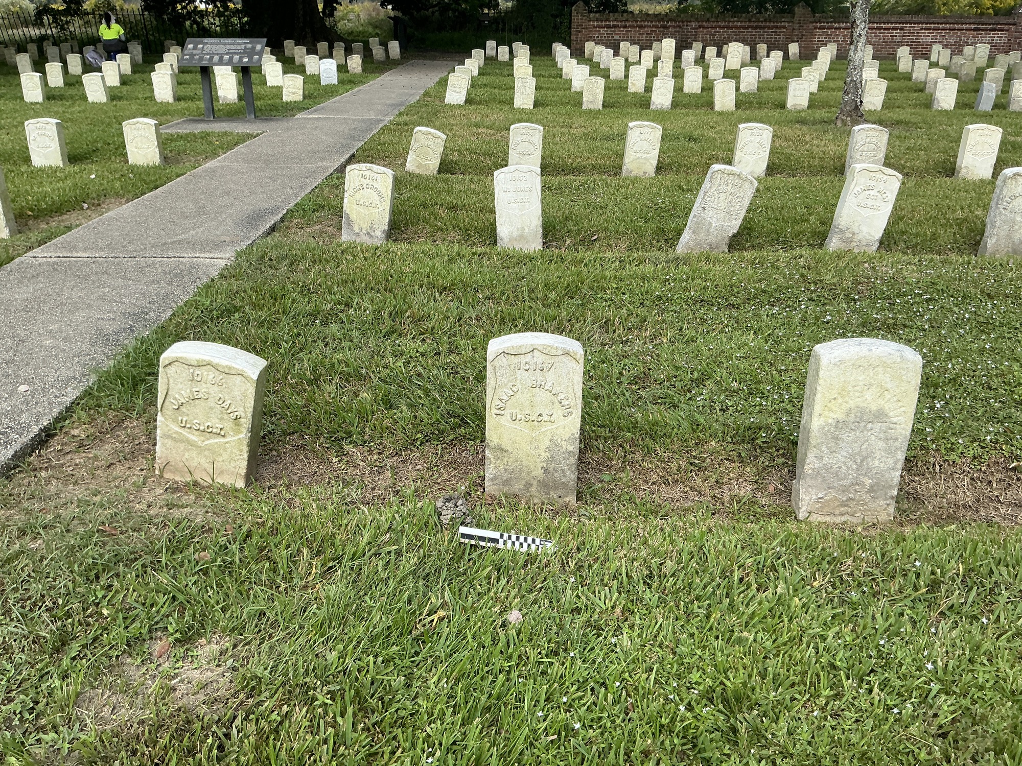 Extra image of historic upright marble headstone with recessed shield face.