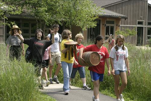 Summer theater campers walking