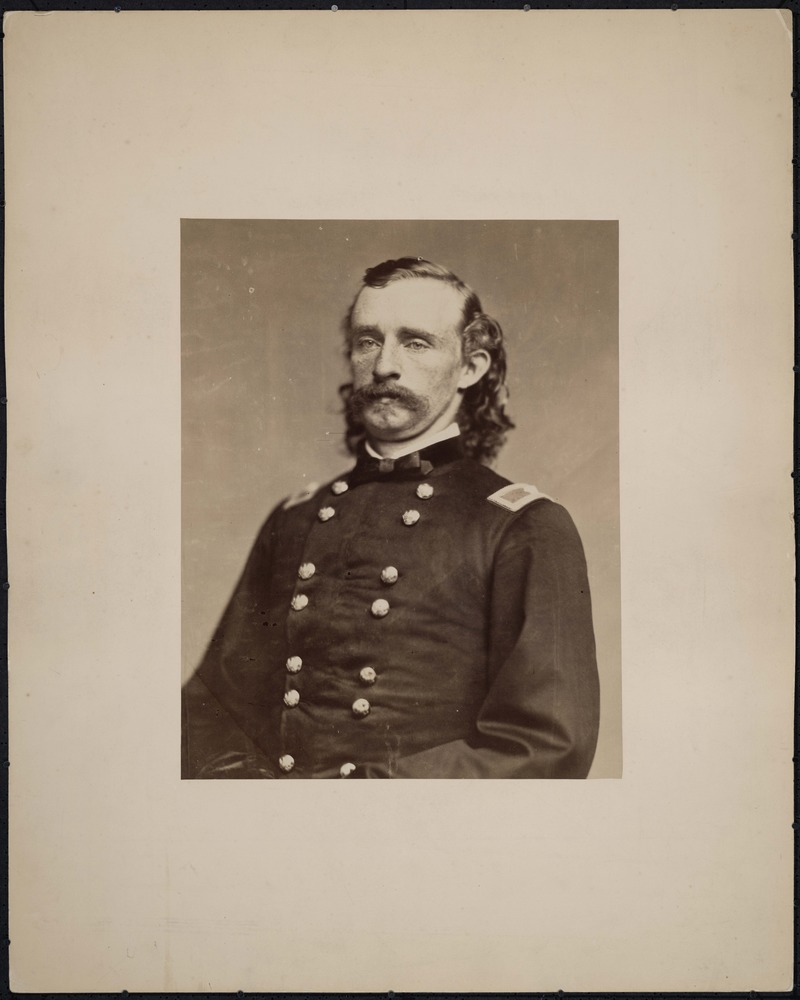 An albument photograph (toned), mounted on card, portrait Brigadier General George Armstrong Custer