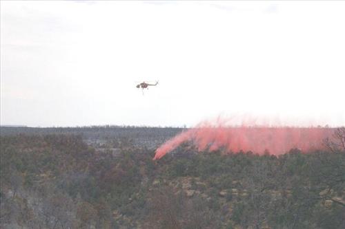 Helicopter involved in fire retardant operations, Long Mesa Fire, Mesa Verde National Park, July-August 2002