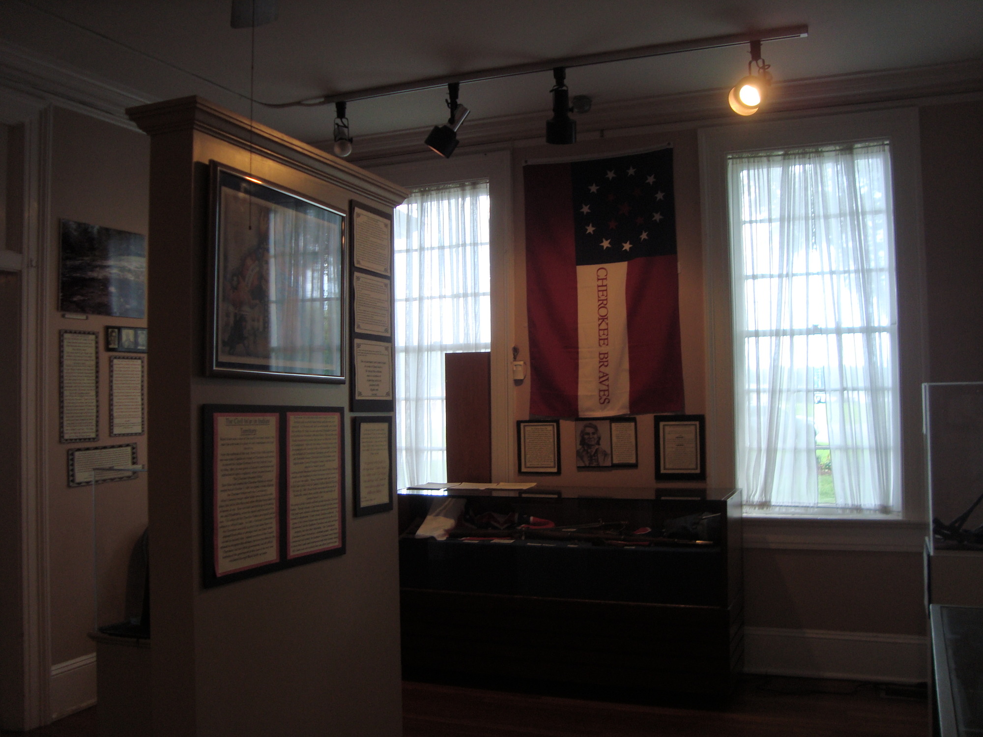 A room with a flag hanging on the wall.