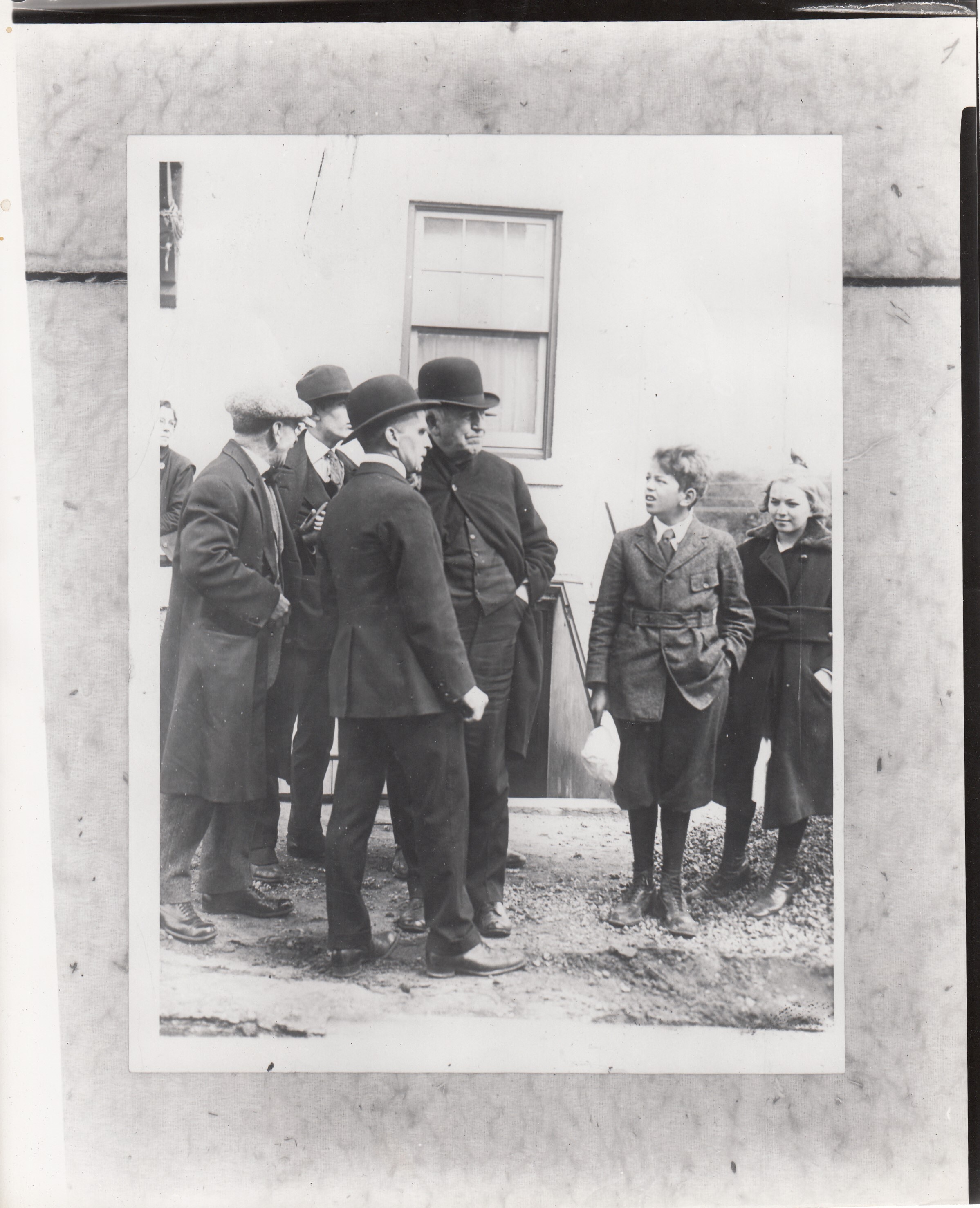Thomas Edison and F.C. Fowler talking over plans to build a row of concrete houses in Union, New Jersey.