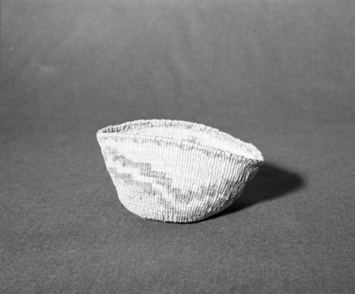 Marie Rozier Collection, Catalog No. 83. Object: Klamath/Modoc basket. Dimensions: 7" x 4 1/2". Materials: made entirely of tule stalk sheath. Collection History: Mrs. Kipling collection. Photographed by Michael Dixon, December 1982. Catalogued by Craig Bates and Barbara Beroza. Yosemite Collections, National Park Service.